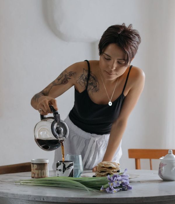 Woman feeling energetic and fresh in the morning light.